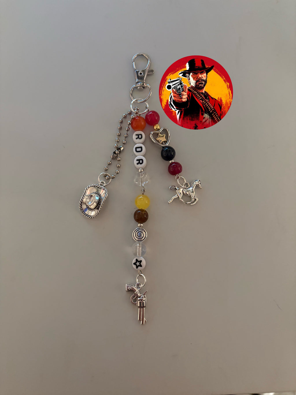 Cowboy outlaw video game inspired handmade keychain