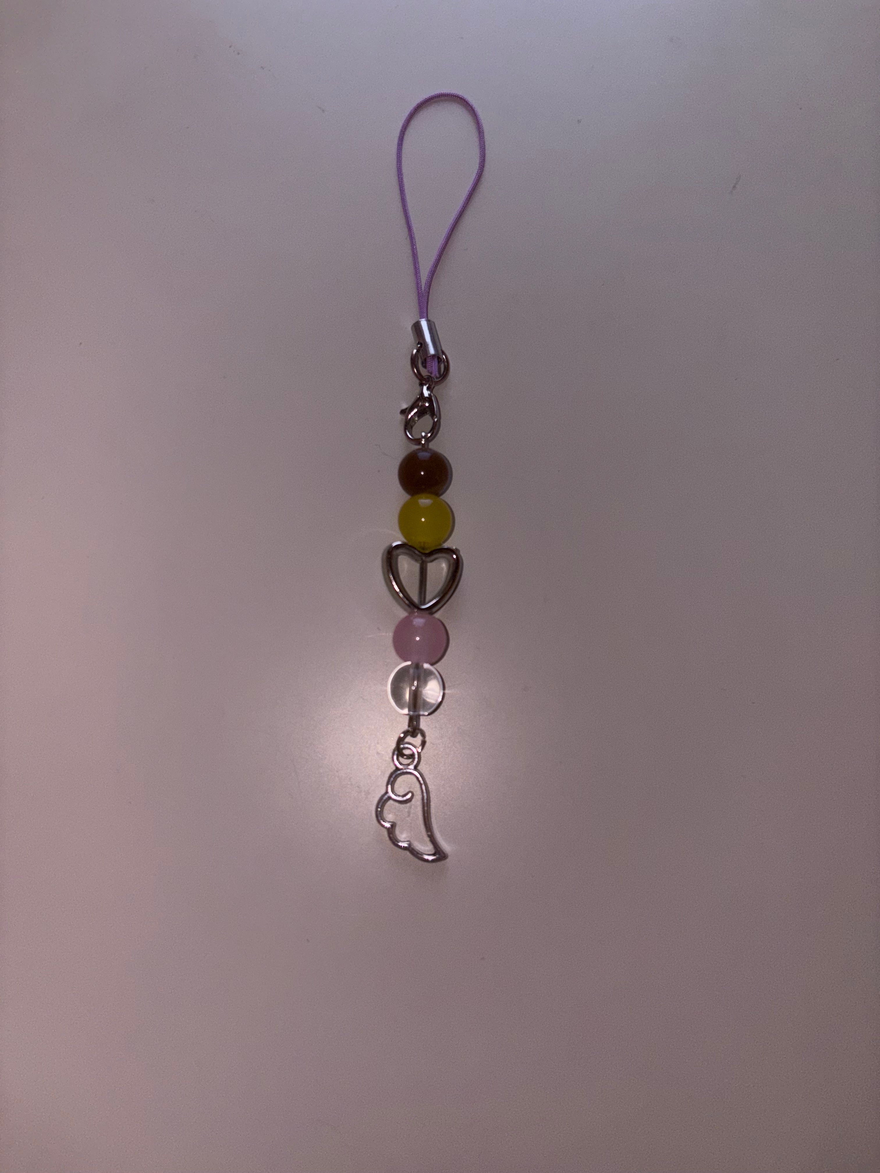 Lou Lou The Hunger Games Sunrise On The Reaping inspired handmade phone charm