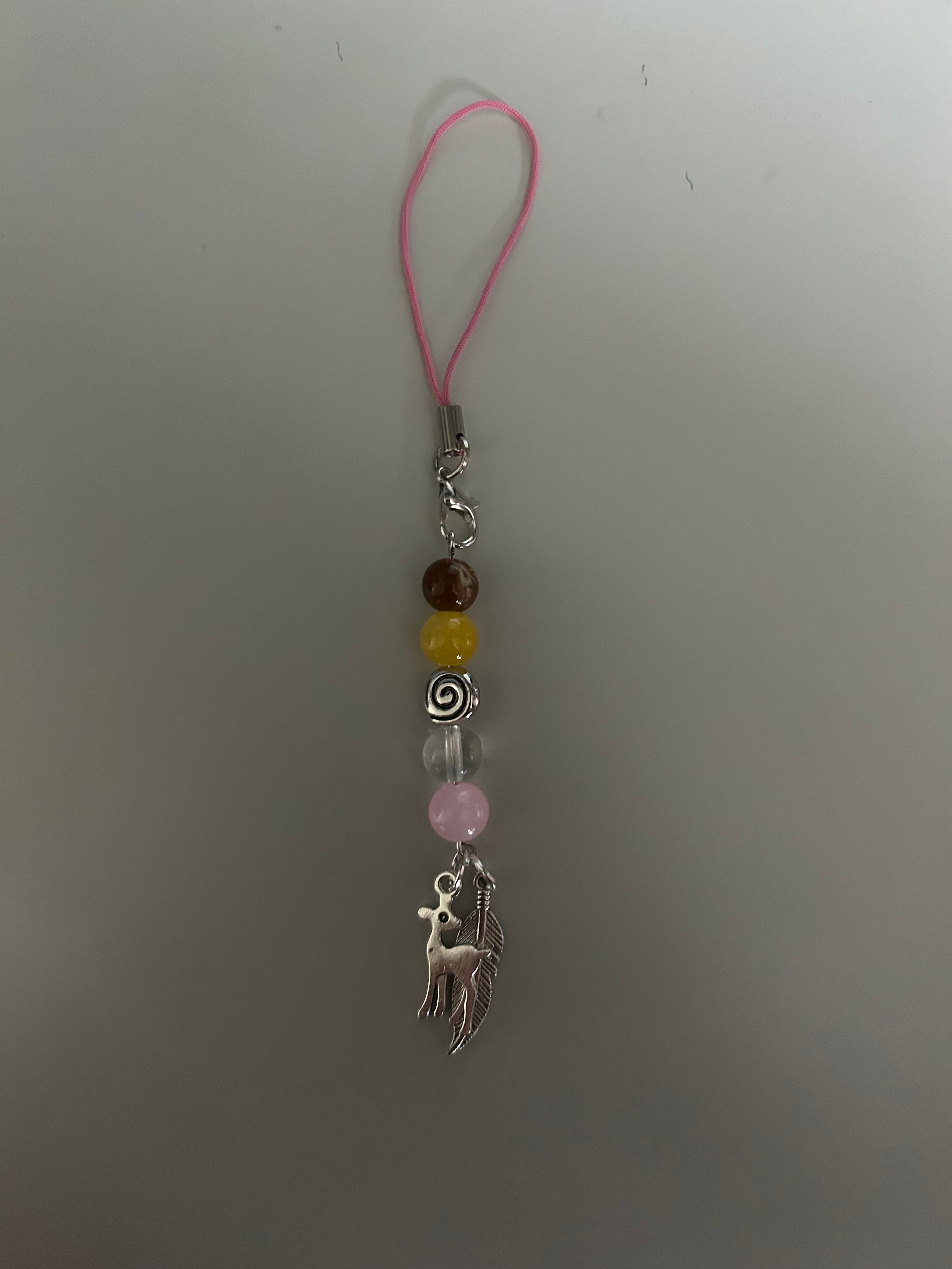 Lottie Matthew’s Yellowjackets inspired handmade phone charm