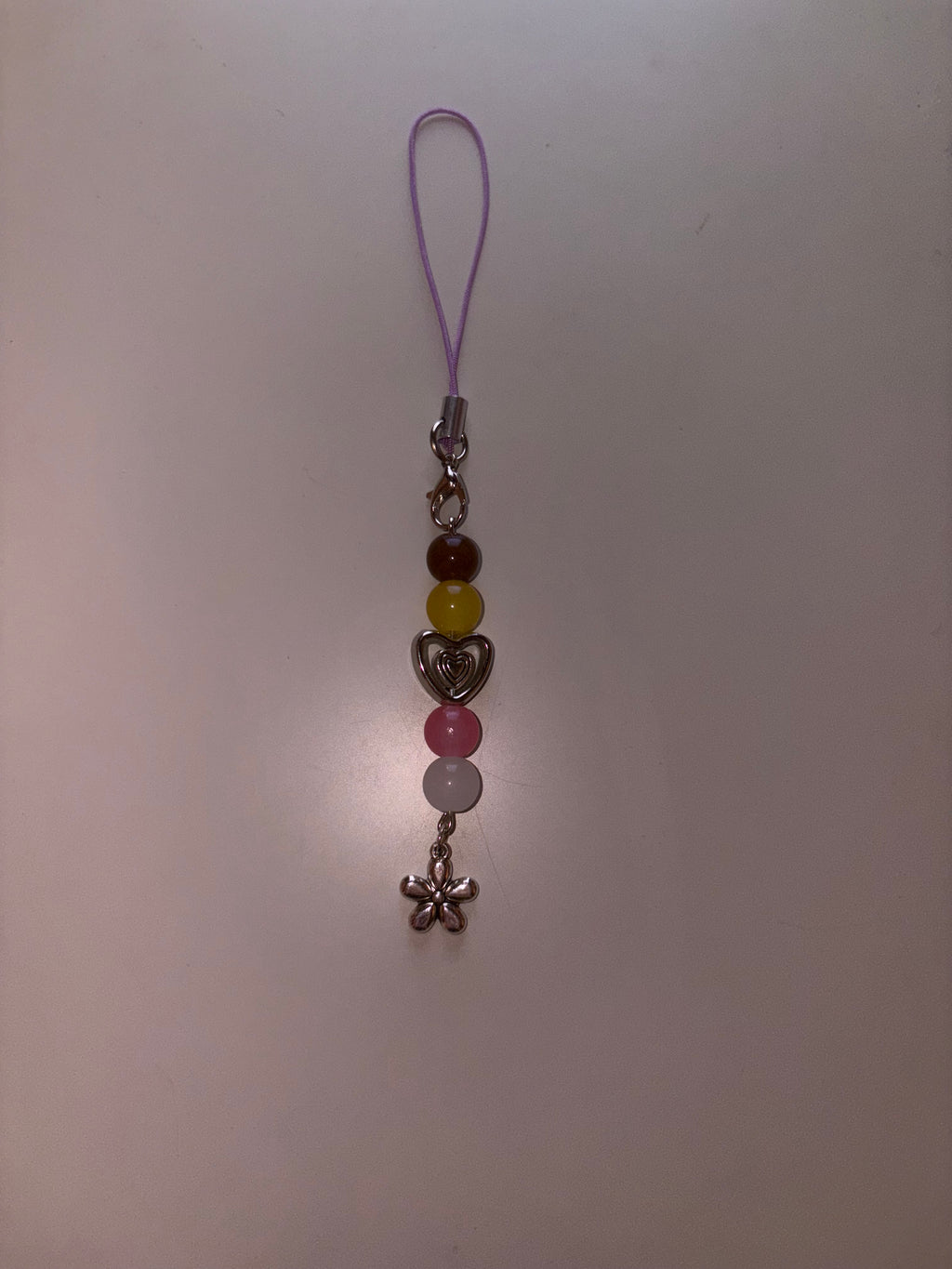 Louella The Hunger Games Sunrise On The Reaping inspired handmade phone charm