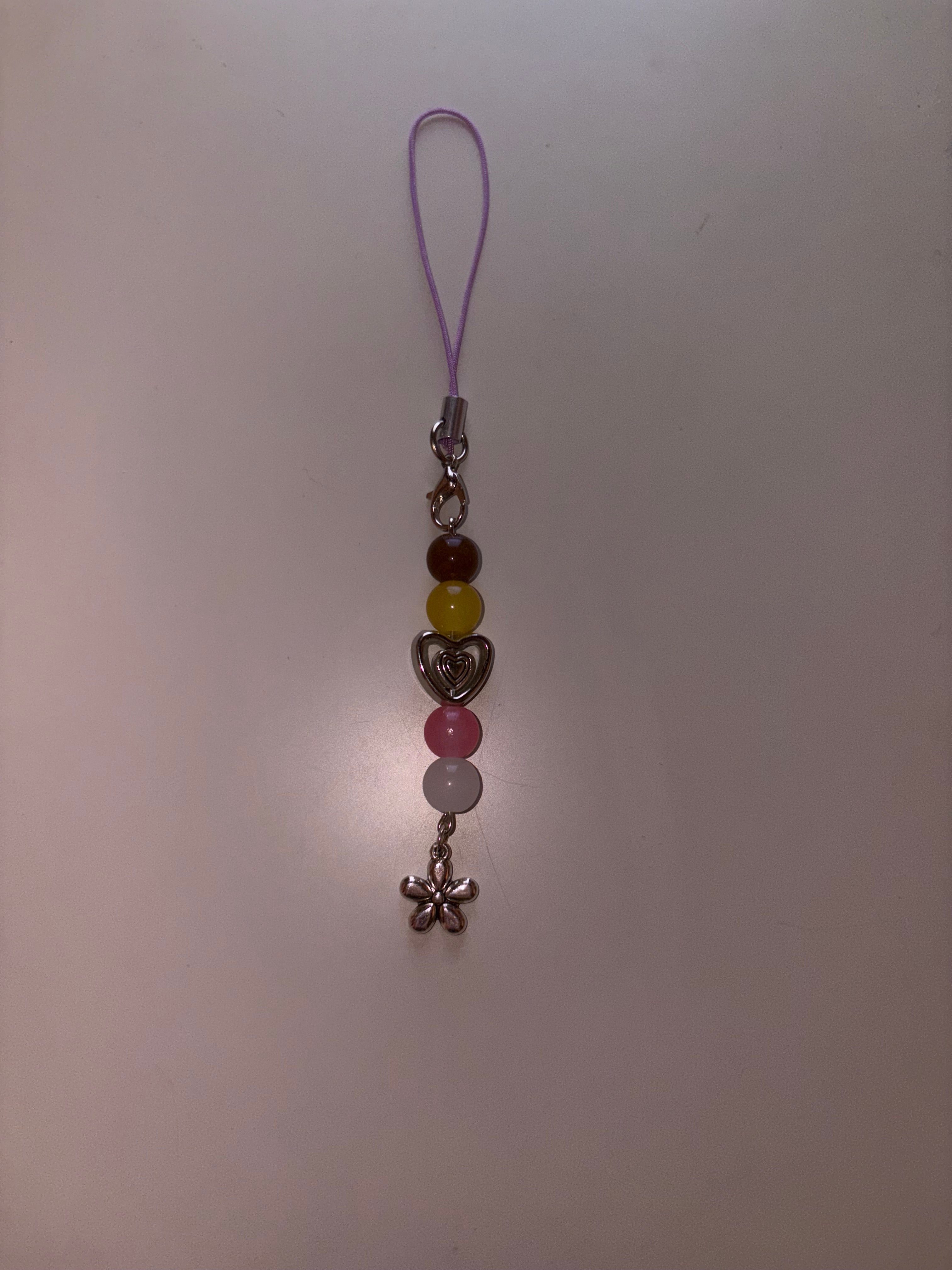 Louella The Hunger Games Sunrise On The Reaping inspired handmade phone charm