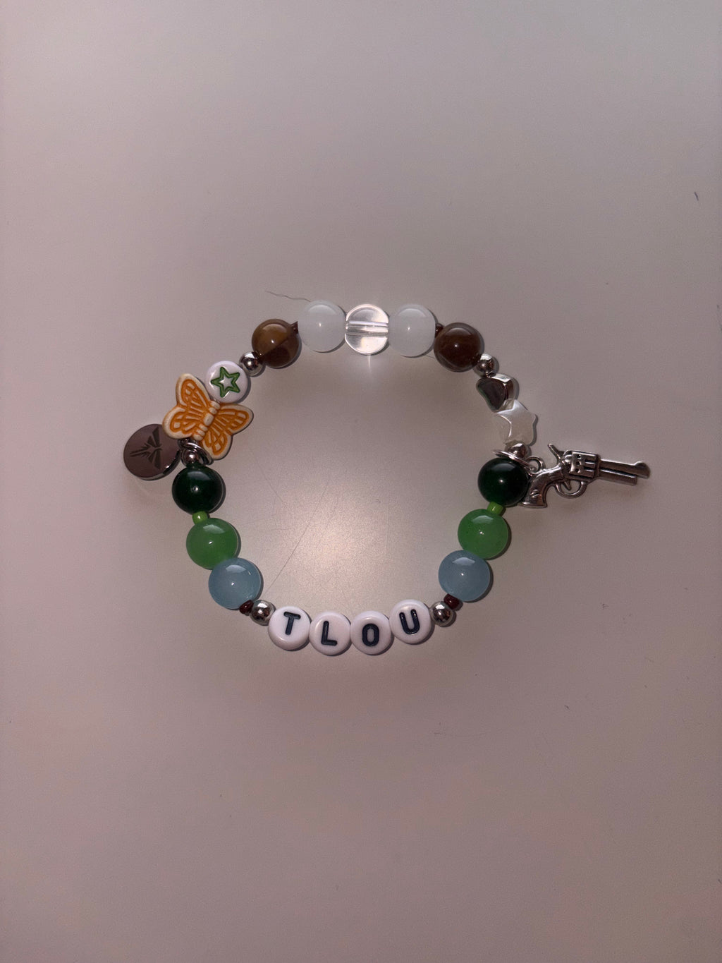 Last of us inspired handmade beaded and charmed bracelet