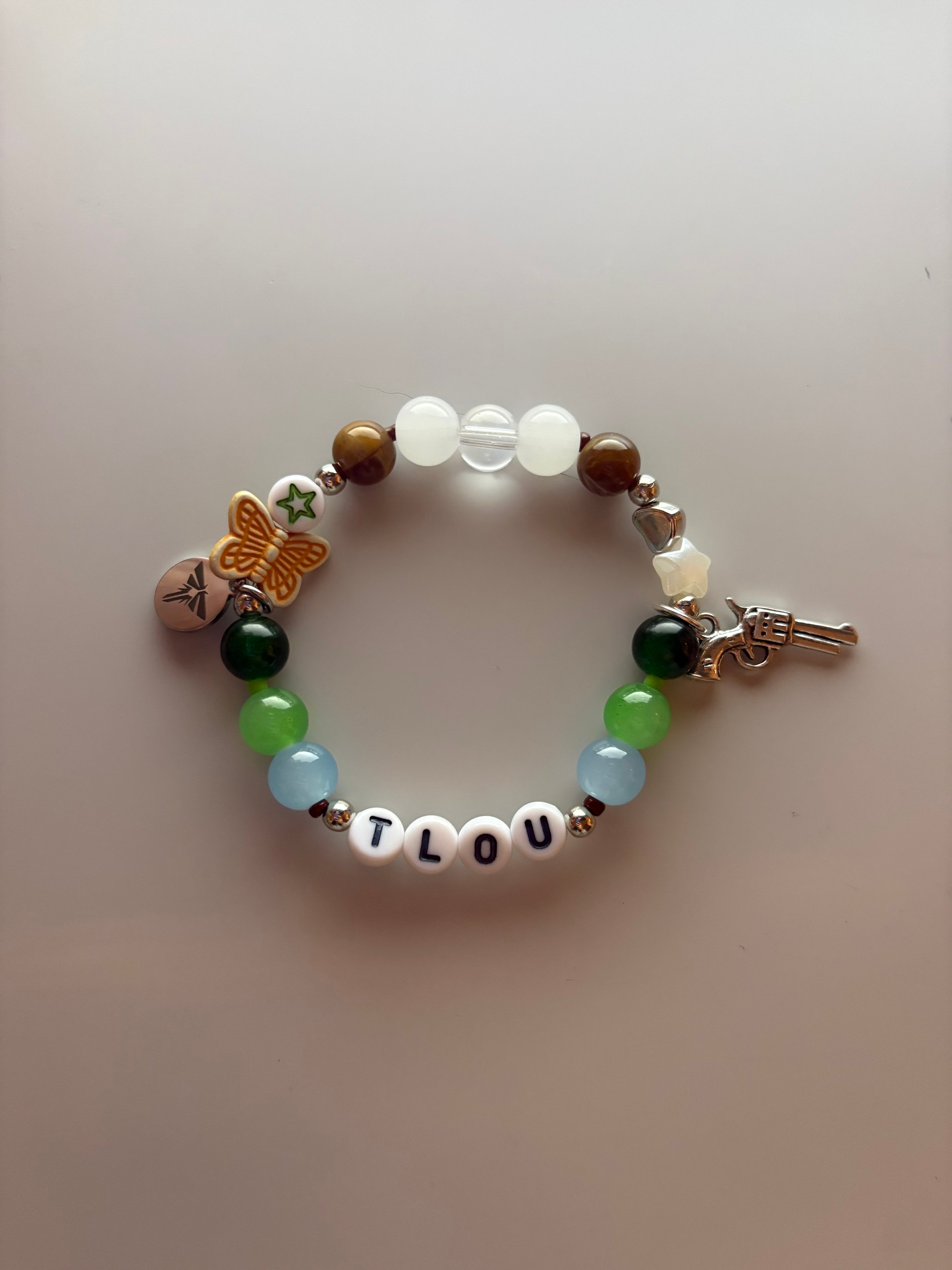 Last of us inspired handmade beaded and charmed bracelet