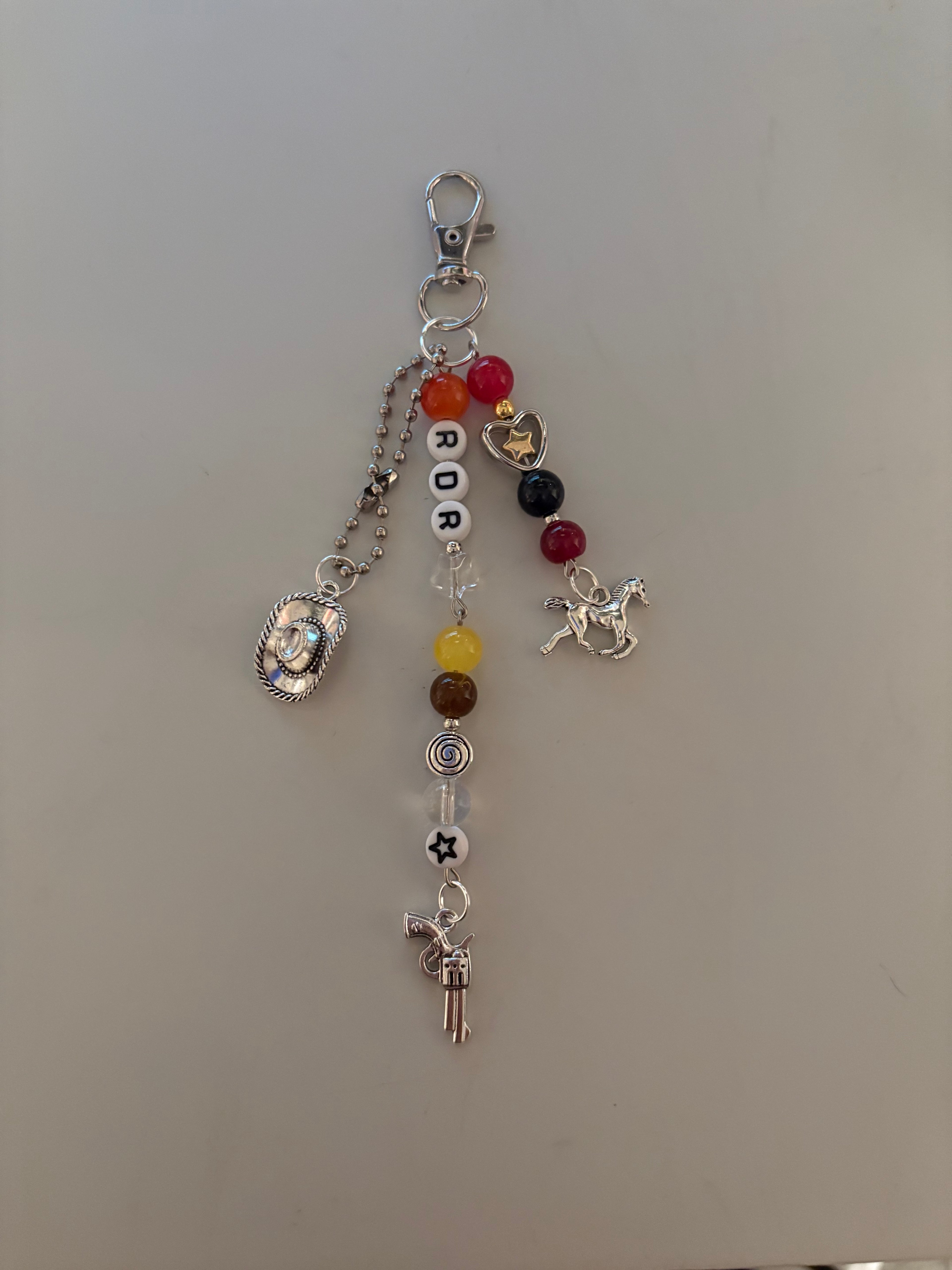 Cowboy outlaw video game inspired handmade keychain