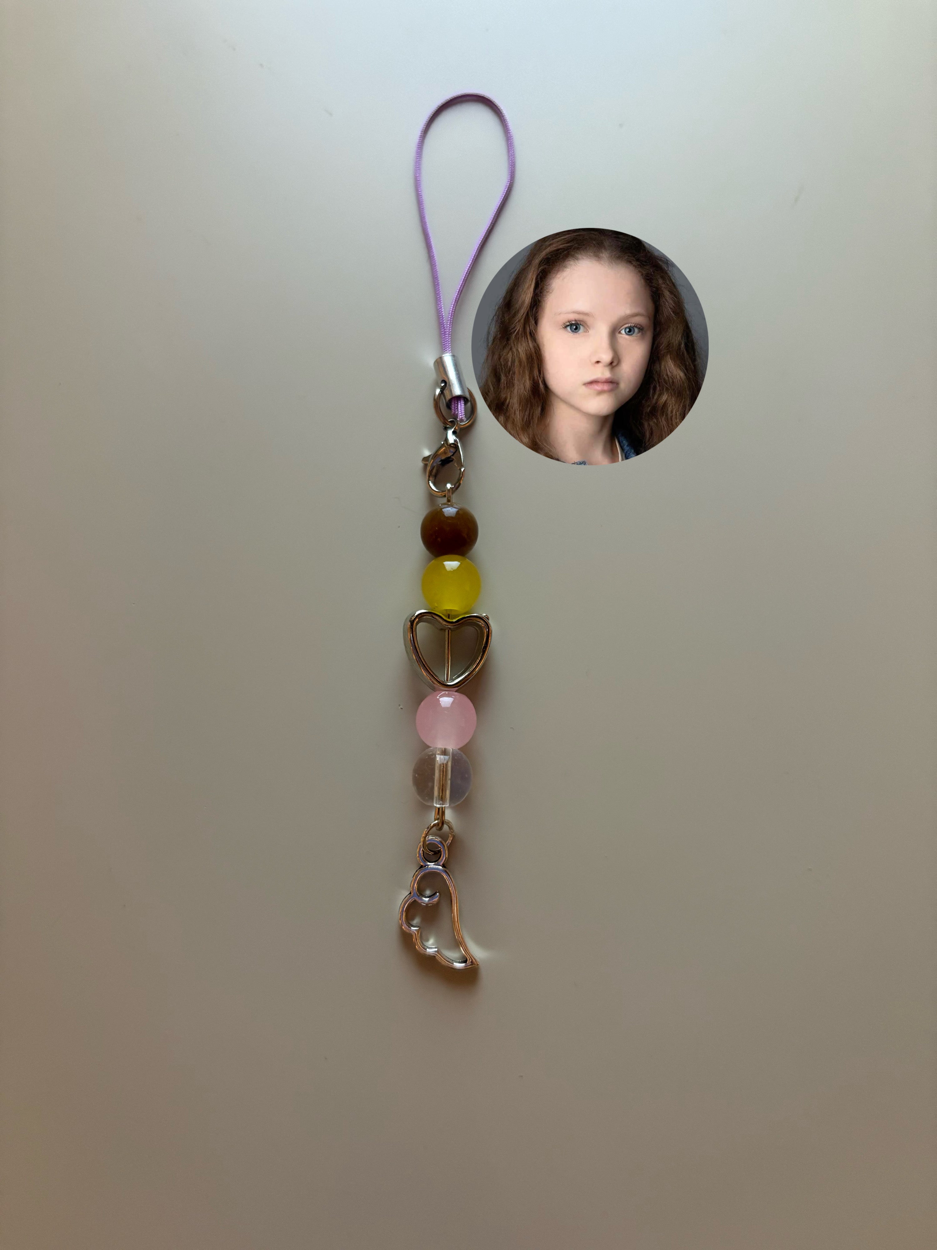 Lou Lou The Hunger Games Sunrise On The Reaping inspired handmade phone charm