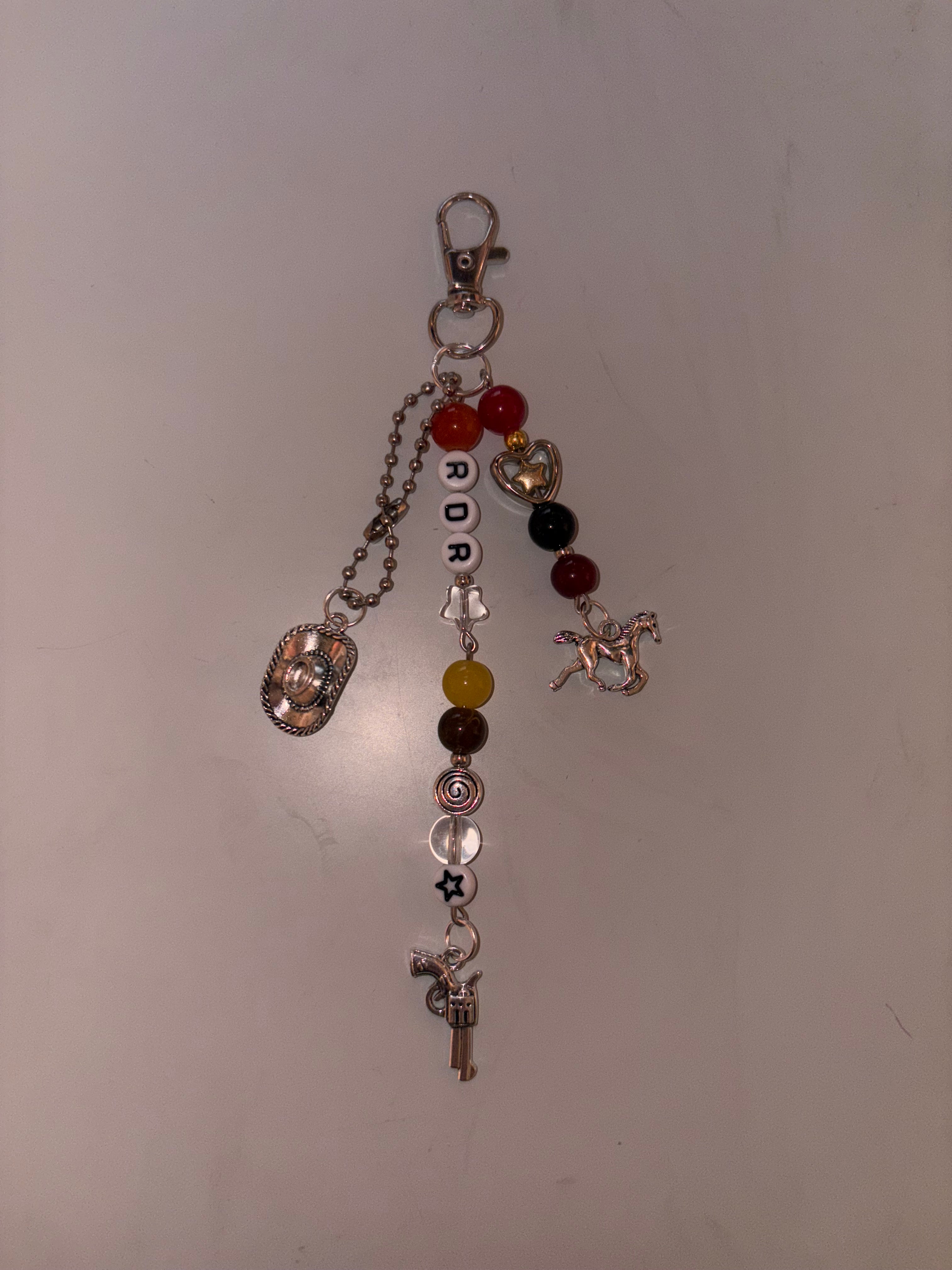 Cowboy outlaw video game inspired handmade keychain