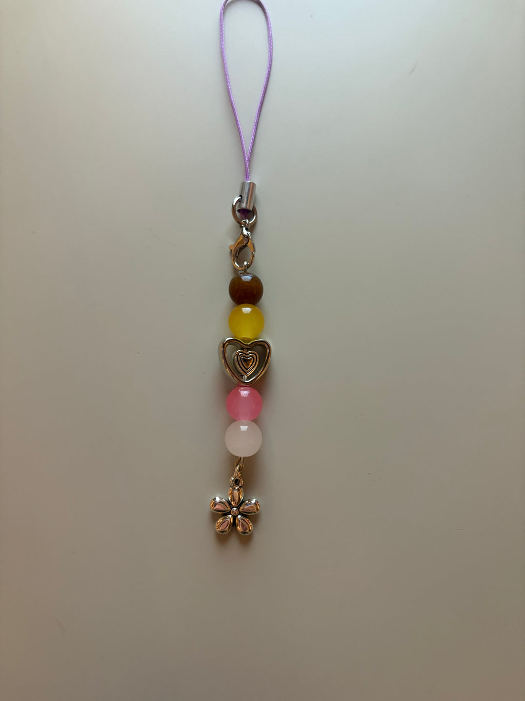 Louella The Hunger Games Sunrise On The Reaping inspired handmade phone charm
