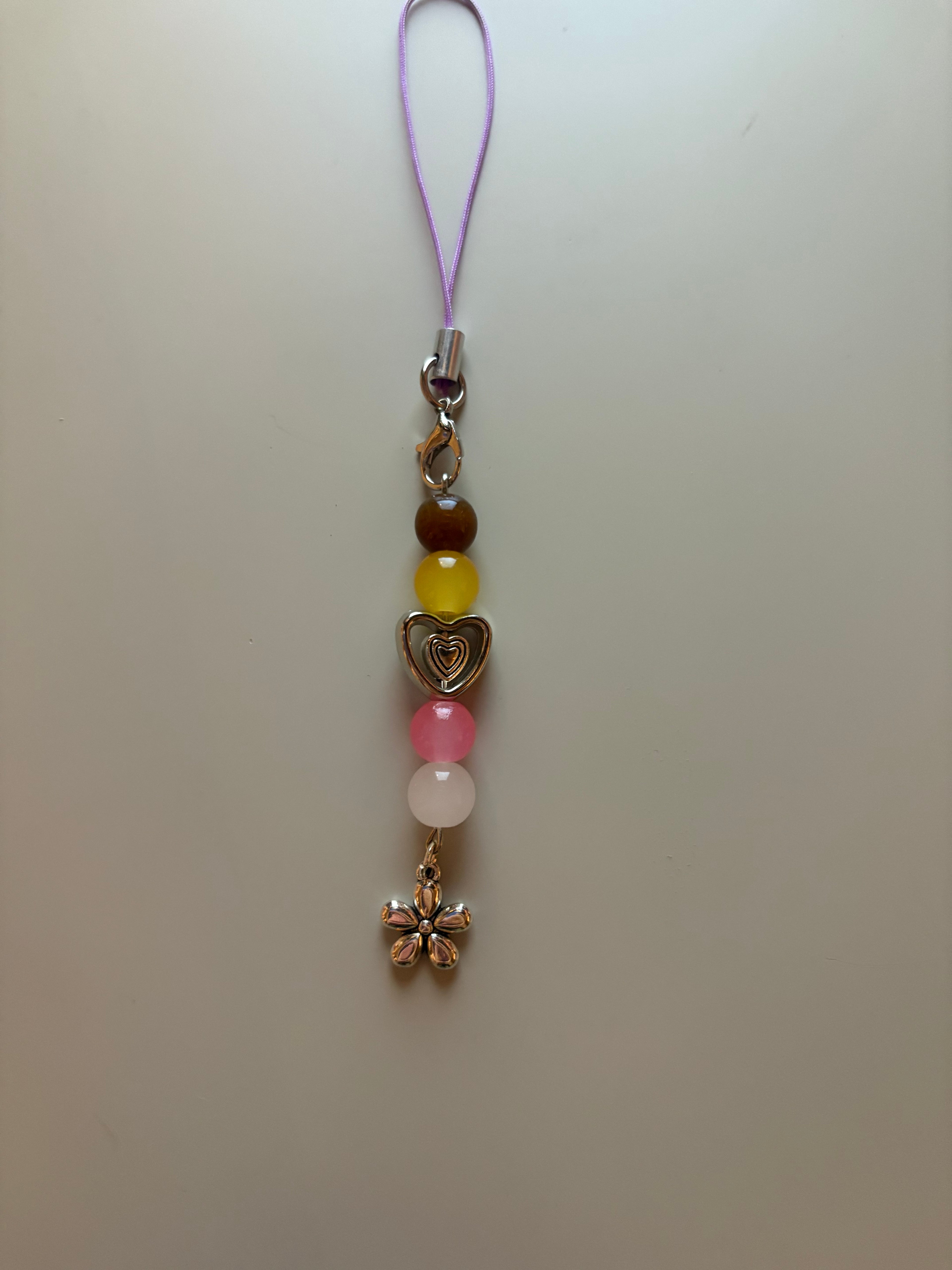 Louella The Hunger Games Sunrise On The Reaping inspired handmade phone charm