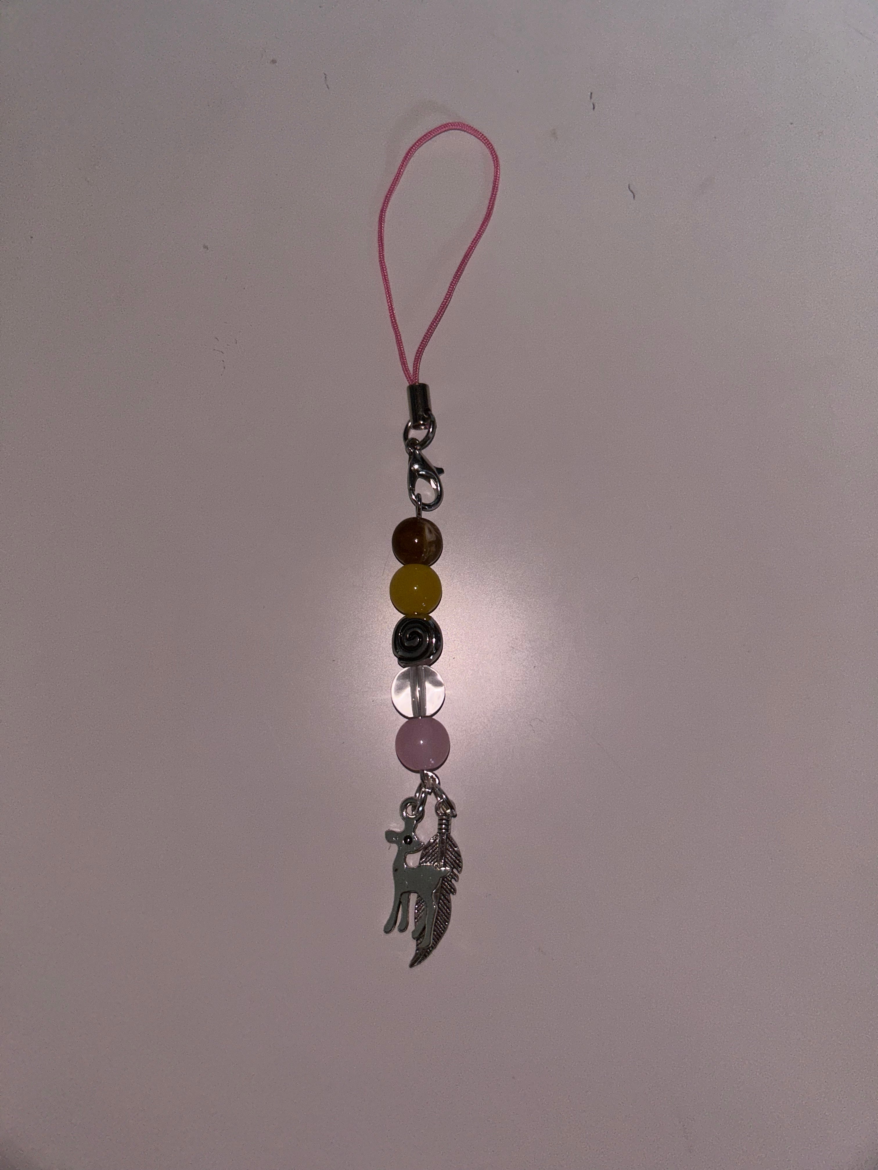Lottie Matthew’s Yellowjackets inspired handmade phone charm