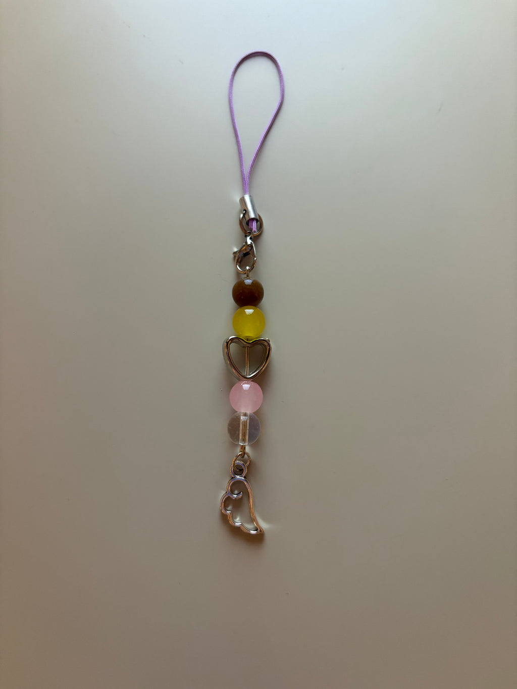 Lou Lou The Hunger Games Sunrise On The Reaping inspired handmade phone charm