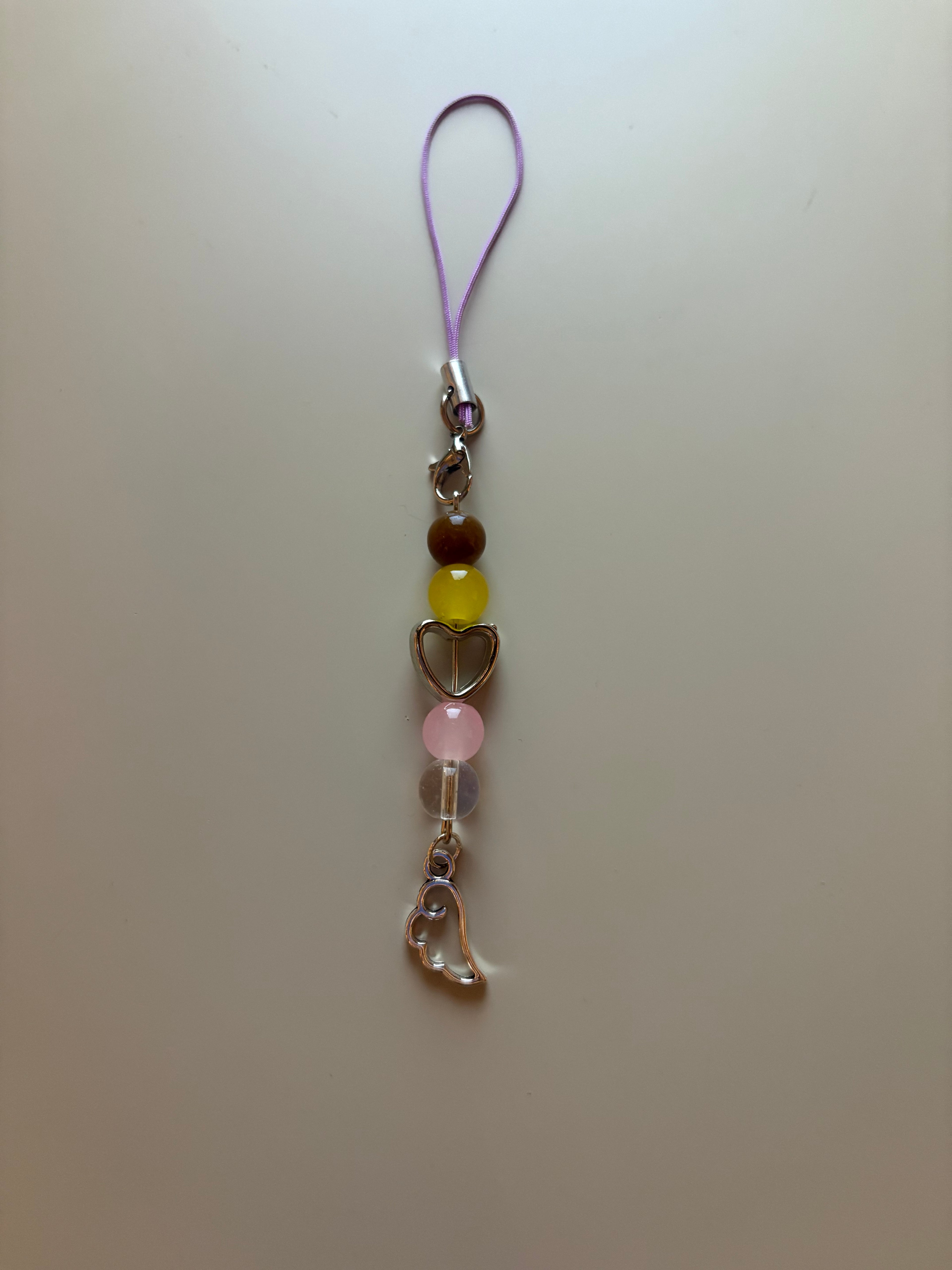 Lou Lou The Hunger Games Sunrise On The Reaping inspired handmade phone charm