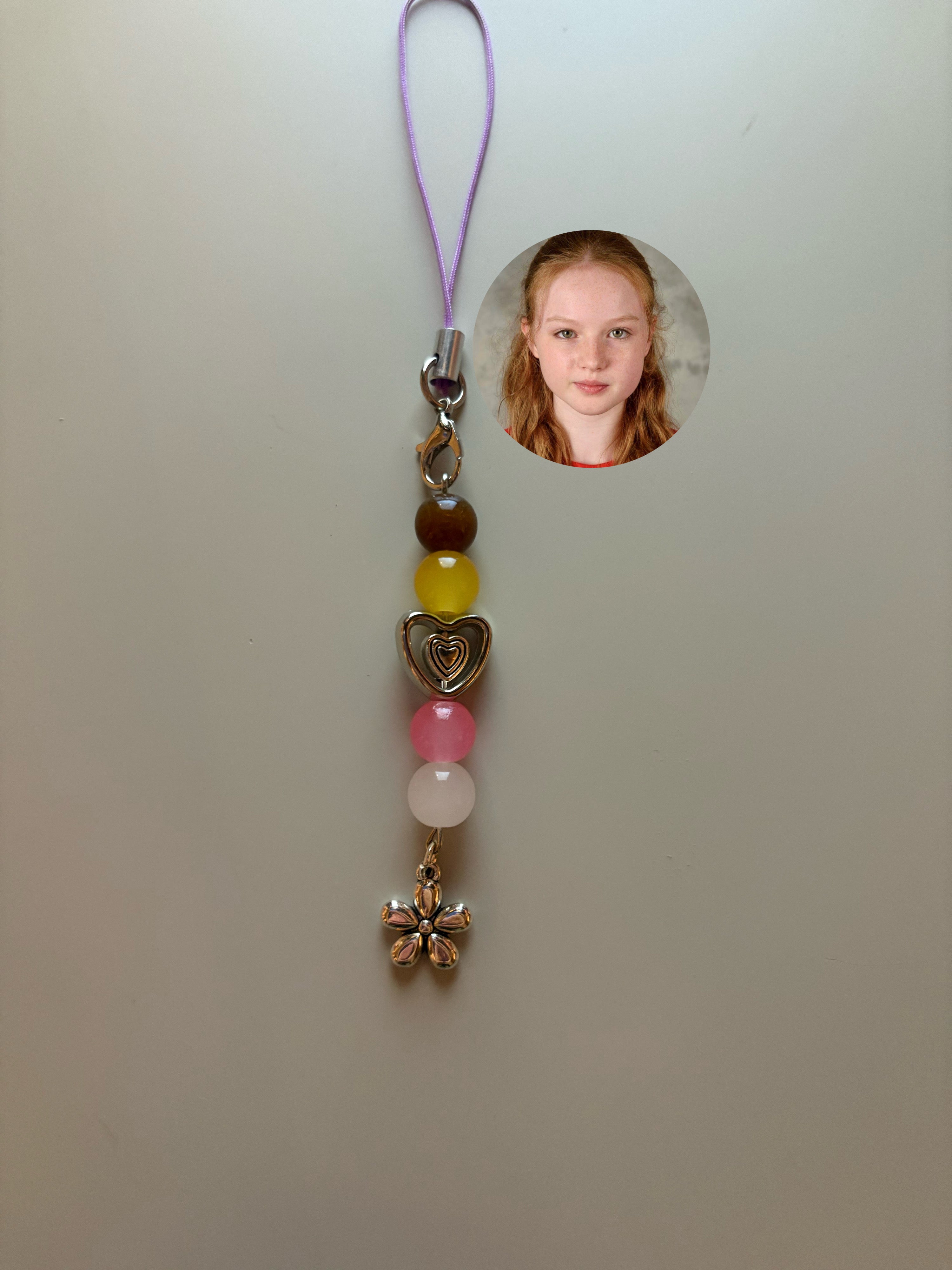 Louella The Hunger Games Sunrise On The Reaping inspired handmade phone charm